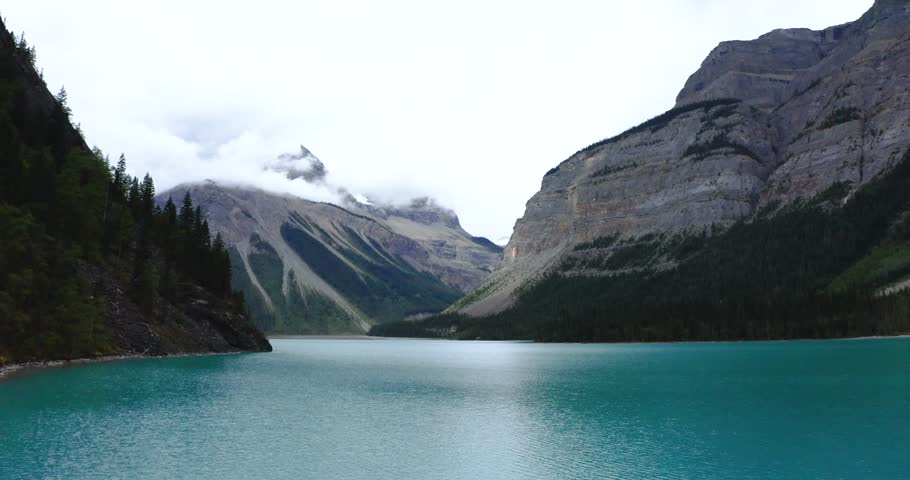 Spectacular drone footage of turquoise Kinney Lake with Mount Robson rising dramatically in the background. Captures the beauty of the Canadian Rockies and one of the region’s most scenic hiking route