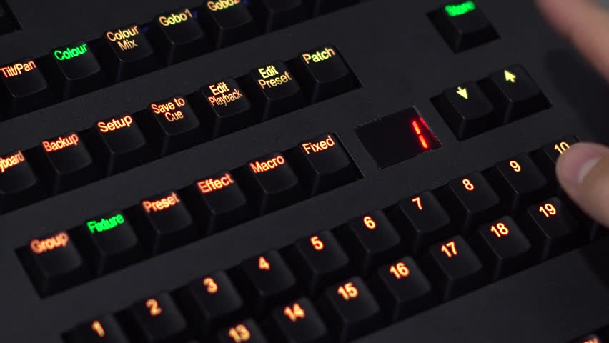 Finger Pressing Arrow to Change Lighting Console Preset in 4K