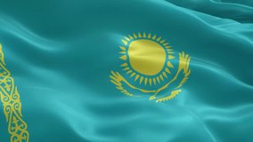 Waving flag of kazakhstan representing national sovereignty, independence, and pride, with its distinctive golden sun, soaring steppe eagle, and ornate pattern. - Powered by Shutterstock - Get 15% off with code: PIKWIZARD15