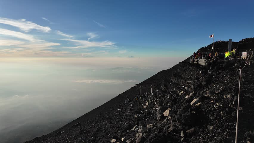 Mount Fuji, Kitayama, Fujinomiya, Shizuoka, Japan, Sunrise over misty landscape viewed from mountain slope