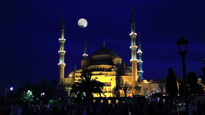Blue Mosque in Istanbul with shining full moon. Night, Timelapse.  
