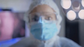 Doctor analyzes patient health using augmented reality holographic display, interacting with digital medical data in a futuristic clinical setting. - Powered by Shutterstock - Get 15% off with code: PIKWIZARD15