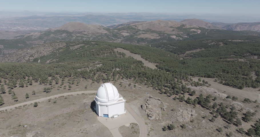 Aerial drone shot towards Calar Alto Observatory in the Sierra de Los Filabres mountain range in Almeria, Andalusia, Spain. Largest astronomical observatory in Europe