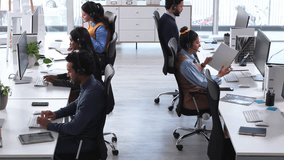 Call center, paperwork and team with headset, coworking and help with troubleshooting on web or app. IT specialist, talking and people with mic for tech support, contact us and discussion in office - Powered by Shutterstock - Get 15% off with code: PIKWIZARD15