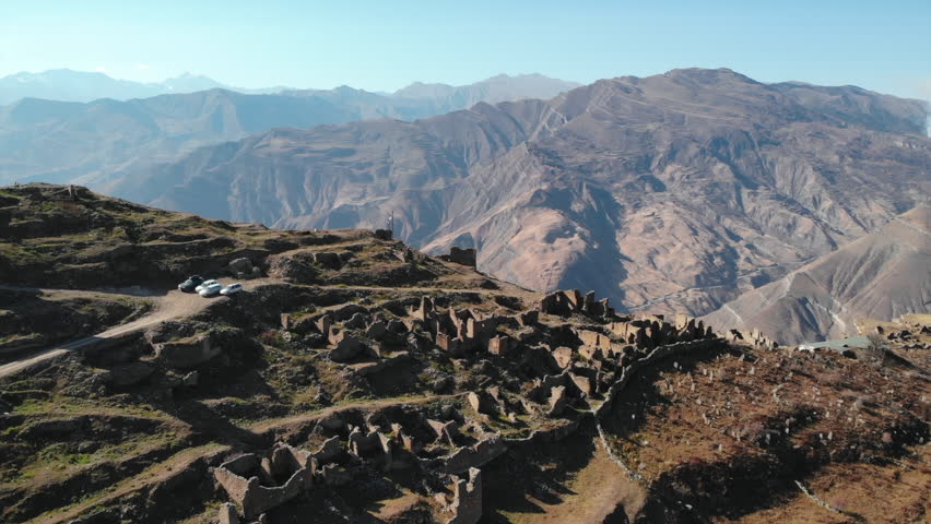 Aerial view of ancient stone ruins in caucasus mountains. Media