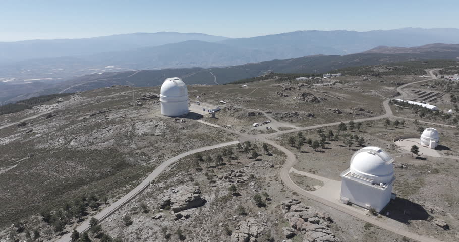Aerial drone shot towards Calar Alto Observatory in the Sierra de Los Filabres mountain range in Almeria, Andalusia, Spain. Largest astronomical observatory in Europe