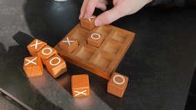 Tic tac toe or Noughts and crosses. Wooden game - Powered by Shutterstock - Get 15% off with code: PIKWIZARD15