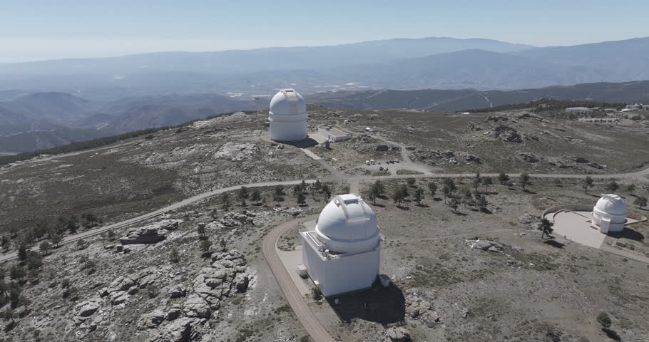 Aerial drone shot towards Calar Alto Observatory in the Sierra de Los Filabres mountain range in Almeria, Andalusia, Spain. Largest astronomical observatory in Europe