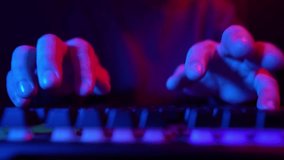 hacker typing on computer laptop pc keyboard, data breaches and financial theft dark room. cybercriminal stealing users bank account credentials. Cyberattack, writing Code technology. teen man woman - Powered by Shutterstock - Get 15% off with code: PIKWIZARD15