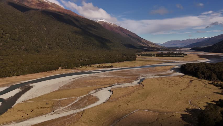 Drone flight through the Mount Aspiring valley with river on the South Island of New Zealand.