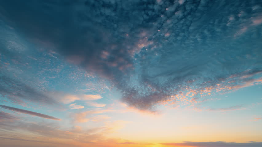 Colorful sunrise paints sky, Calm morning with colorful cloud display, Stunning sunrise illustrating serene morning atmosphere with vibrant pastel clouds and warm glow