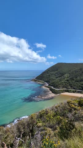 Short panoramic video capturing the turquoise ocean, winding coastal road, and lush hills from Teddy’s Lookout in Lorne. Dramatic cliffs and pristine shoreline under bright blue skies.