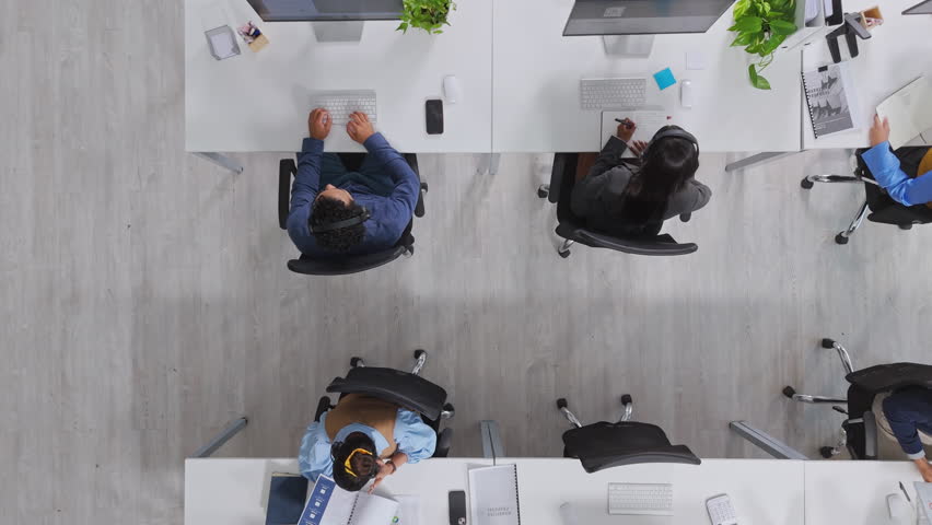 People, call center and above for contact, group or customer support with pc at investment company. Men, women and consultant team in office, voip headset or financial advisory services at agency - Powered by Shutterstock - Get 15% off with code: PIKWIZARD15