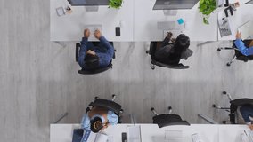 People, call center and above for contact, group or customer support with pc at investment company. Men, women and consultant team in office, voip headset or financial advisory services at agency - Powered by Shutterstock - Get 15% off with code: PIKWIZARD15