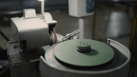 Grinding machine operating, sharpening a tool in an industrial workshop - Powered by Shutterstock - Get 15% off with code: PIKWIZARD15