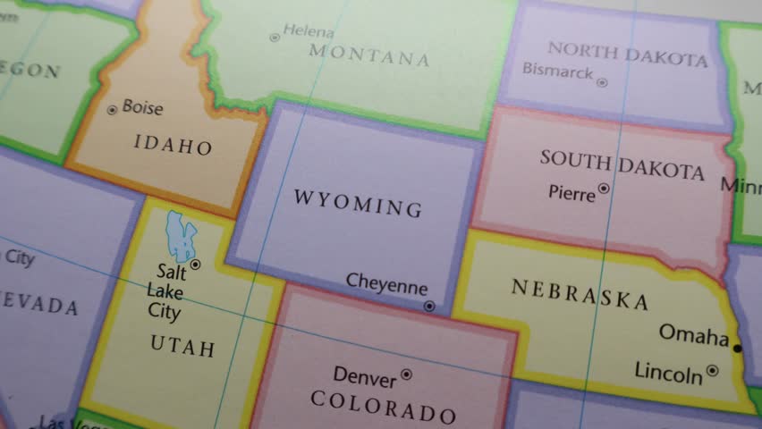 Wyoming and Surrounding States on Colorful USA Map. Mountain West Geography, Road Trip and Administrative Concept.