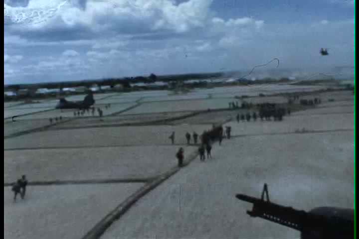 1960s - Aerial combat footage in Vietnam includes a well filmed bombing run on a Vietnamese village, 1966.