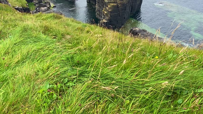 Ruins of Castle Sinclair Girnigoe, Scotland. It is located about 3 miles north of Wick on the east coast of Caithness, Scotland. It is considered to be one of the earliest seats of Clan Sinclair.