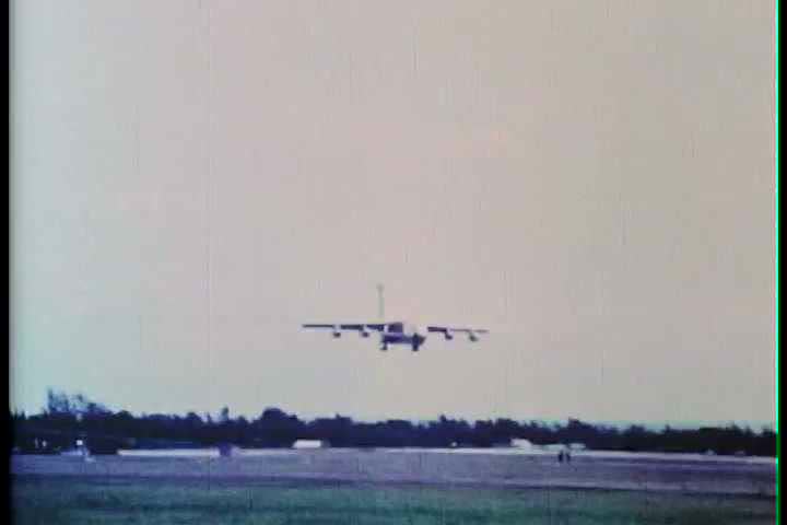 1960s - Air Force personnel unload a cargo plane during the Vietnam War.