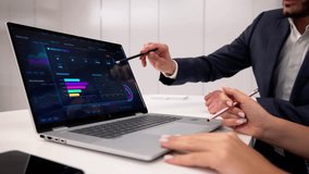 Business People Analyzing Data On Laptop Using Analytics Dashboard Software - Powered by Shutterstock - Get 15% off with code: PIKWIZARD15