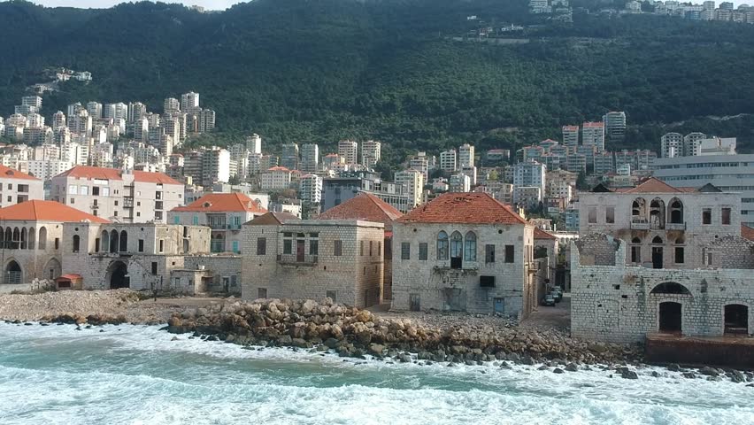 15 February 2025 – Jounieh, Keserwan District, Lebanon – Aerial view of old coastal houses with red-tiled roofs overlooking the Mediterranean Sea.