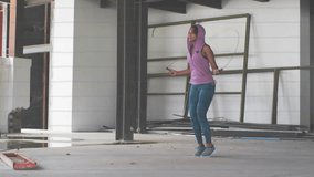 Hand drawing yellow pin, woman skipping rope in warehouse overlaying workout location for creators. Industrial, construction, concrete, steel, fitness, cardio, athletic - Powered by Shutterstock - Get 15% off with code: PIKWIZARD15
