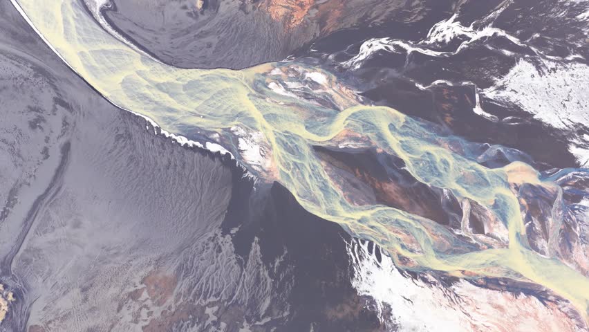 Aerial view of river meeting the ocean, Iceland.