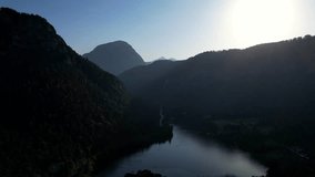 4K Aerial Drone video of Alpine lake Thumsee with turquoise water and lush green woods surrounded by tall mountains at sunset golden hour in Bad Reichenhall Germany - Powered by Shutterstock - Get 15% off with code: PIKWIZARD15