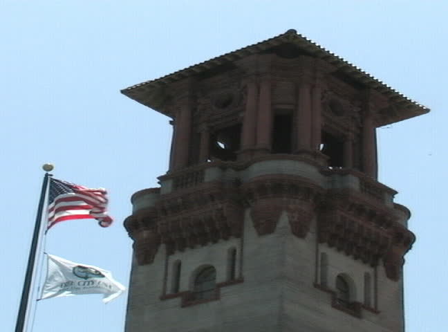 Old Spanish building in St. Augustine, Florida with flags