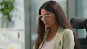 Happy birthday surprise at office amazed shock Indian businesswoman female woman employee get cake blowing candle from coworkers celebrating occasion working cheerful informal diversity business team - Powered by Shutterstock - Get 15% off with code: PIKWIZARD15