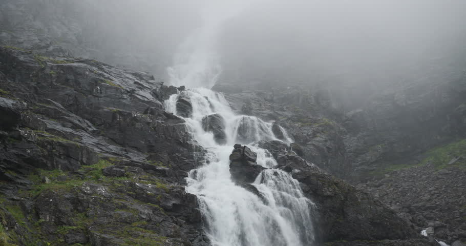 Powerful Waterfall in Fog at Trollstigen, Norway