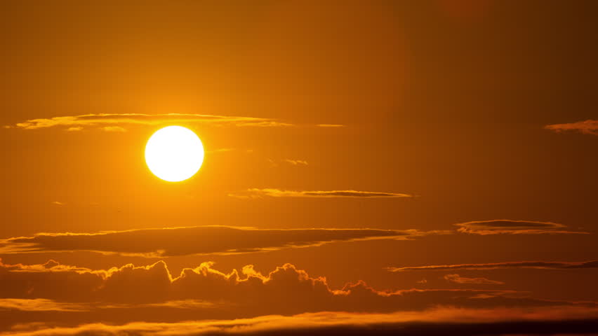 Time Lapse of the Sun Moving Across the Sky with Dramatic Light and Clouds