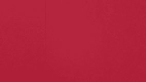 Close-up of crimson red felt surface with smooth horizontal panning motion. Elegant abstract background suitable for Christmas, Valentine, and luxury design concepts. - Powered by Shutterstock - Get 15% off with code: PIKWIZARD15