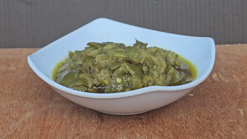 Sambal hijau,Sambal Ijo,Sambal lado mudo,Green chili sambal,Green chili paste,Green chili sauce.Traditional Indonesian sambal from West Sumatra
