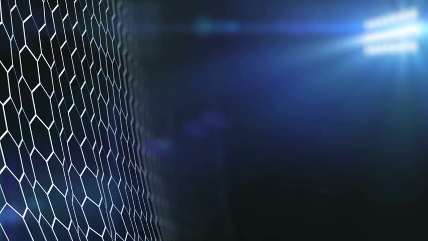 A soccer ball flies in slow motion, striking and tearing the goal net under bright stadium lights, captured in 4K 3D animation for dynamic sports visuals.