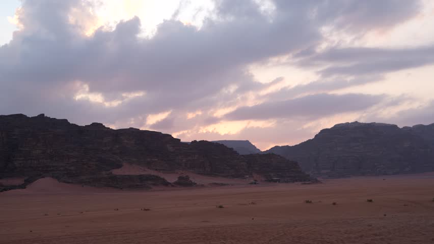 Wadum Rum desert with mountains at sunset in Jordan