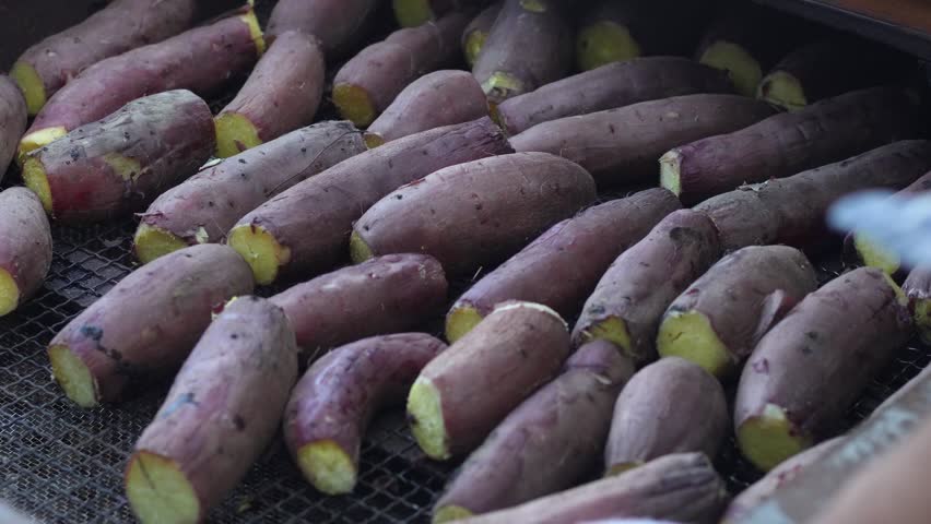 Man making roasted sweet potatoes