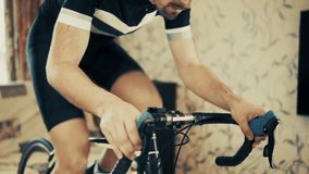 Cyclist Training On Indoor Bicycle Trainer. Home Cycling Workout, Fitness And Cardio Exercise Indoors Sportive Activity. Stationary Bike Training Winter Cycling Preparation. Bicycle Trainer   Exercise - Powered by Shutterstock - Get 15% off with code: PIKWIZARD15