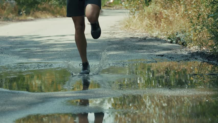 Sporty Man Running. Runner Jogging Physical Wellness Routine. Endurance Workout Trail Running. Cardio Training Morning Run. Fitness Exercise Outdoors Afternoon Fitness.Athlete Training Running Workout