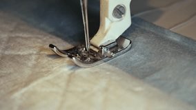 Sewing machine in action as it creates beautiful patterns on fabric in a cozy workshop setting during the afternoon - Powered by Shutterstock - Get 15% off with code: PIKWIZARD15