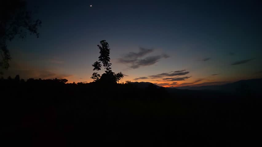 Scenic Mountain Landscape at Sunrise. Time Lapse of Beautiful Mountain View at Sunrise in Gorontalo Mountains, Indonesia