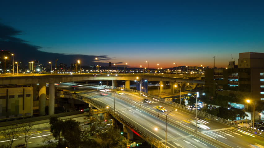 sunset night illumination taipei city traffic road junction aerial panorama 4k timelapse taiwan