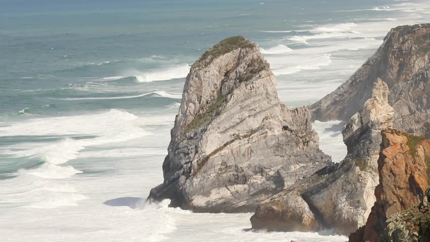 Video of Cabo da Roca cliffs in Sintra with powerful ocean waves crashing against rugged rocks