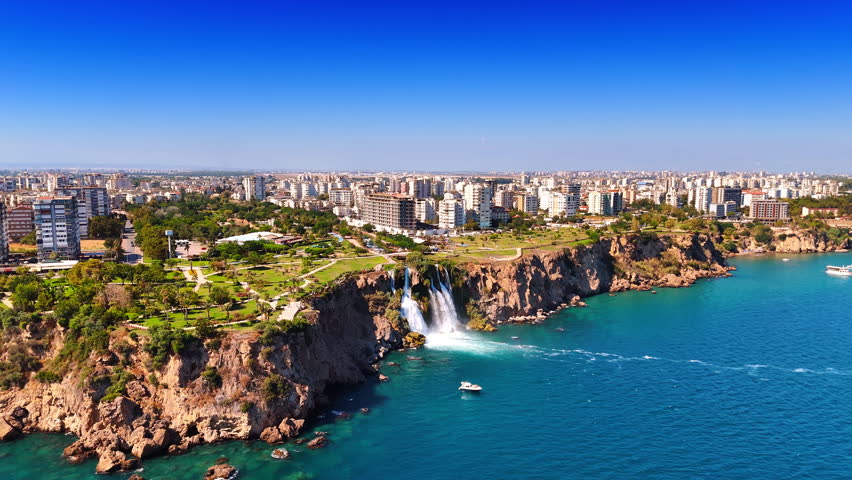 The Duden Waterfalls located in the Antalya Province, southern Turkey. Beautiful natural wonder and a popular tourist attraction. Drone footage above the waterscape of the Mediterranean Sea.