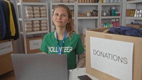 Woman displays badge and pointing gesture in center as volunteer beside laptop and smartphone, smiling with blonde young features. - Powered by Shutterstock - Get 15% off with code: PIKWIZARD15