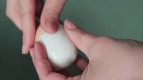peeling an egg - Dramatic Slow Motion of Egg Shell Being Removed from Hard-Boiled Egg and falling in abyss - Powered by Shutterstock - Get 15% off with code: PIKWIZARD15
