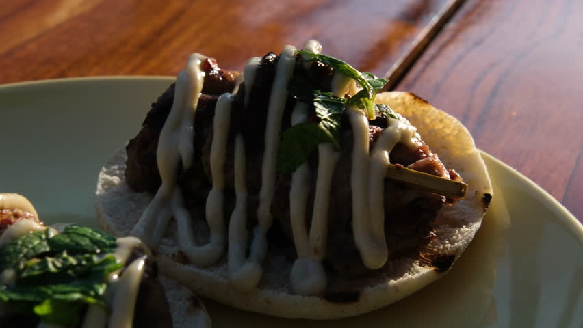 Tacos plate sauce Traditional mexican food. Shrimp tacos with melted cheese and poblano pepper called gobernador on wooden background.