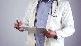 Doctor's hands, documents, and writing in a medical checklist, medical record, or hospital record for patient care or progress. Clinician or surgeon at clipboard, documents, and medical results or rep - Powered by Shutterstock - Get 15% off with code: PIKWIZARD15