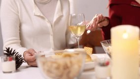 Women praying before thanksgiving meal at home. - Powered by Shutterstock - Get 15% off with code: PIKWIZARD15