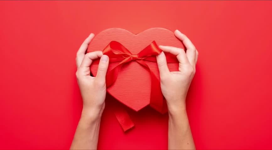 Happy Valentines Day gift Box with flying heart